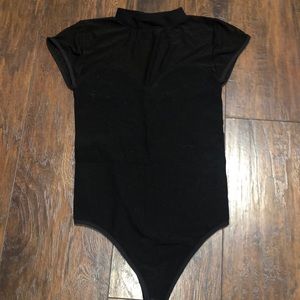 Bebe Black body suit with sheer top